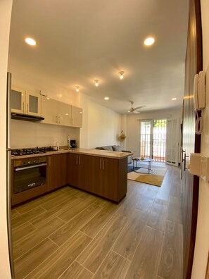 Fridge, stovetop, coffee/tea maker, cookware/dishes/utensils