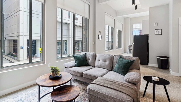 Deluxe Apartment, 5 Bedrooms | 2 units | Living area | 32-inch Smart TV with digital channels - CozySuites at Textile (Cincinnati)
