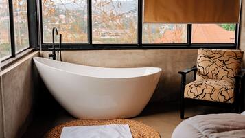 Shower, towels, soap, toilet paper