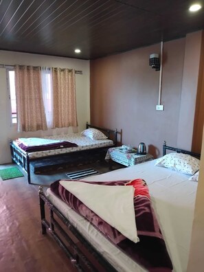 Quarto triplo, vista para a montanha