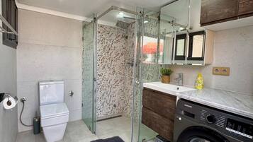 Jetted tub, hair dryer, towels, soap