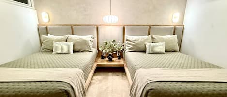 2 bedrooms, desk, iron/ironing board, travel crib