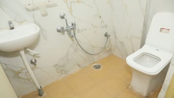 Family Room, City View | Bathroom | Shower, towels, soap, shampoo