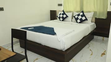 Family Room, City View | Individually furnished, desk, laptop workspace, free WiFi