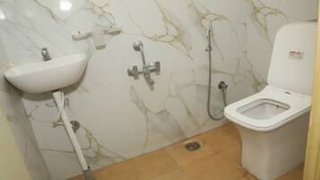 Family Room, City View | Bathroom | Shower, towels, soap, shampoo