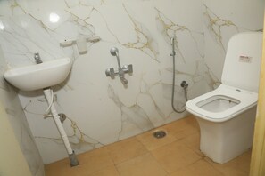 Family Room, City View | Bathroom | Shower, towels, soap, shampoo