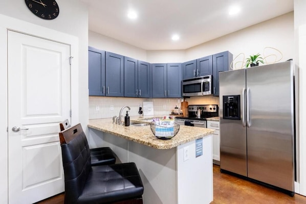 Family Condo, 2 Bedrooms, Non Smoking, Kitchen | Private kitchen | Full-size fridge, microwave, oven, stovetop