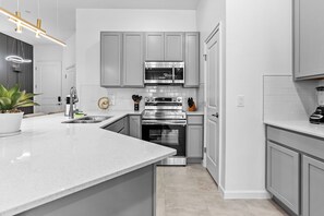 Stovetop, dishwasher, coffee/tea maker, toaster