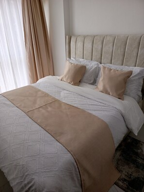 1 bedroom, iron/ironing board, Internet, bed sheets - Cozy studio apartment in Smarthome Kilimani (Nairobi)