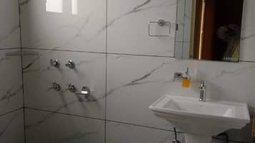 Shower, free toiletries, towels, soap