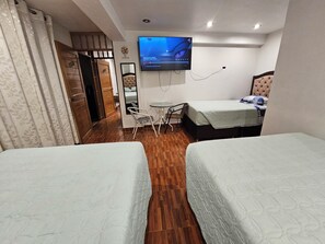 4 habitaciones, escritorio, wifi gratis y ropa de cama