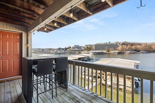 Lakeside Condo Near Margaritaville w/ Dock, Boat Slip, Pool, & Mini Bar