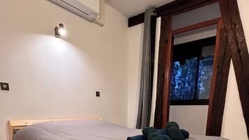 2 quartos, berço de viagem, Wi-Fi de cortesia, roupa de cama