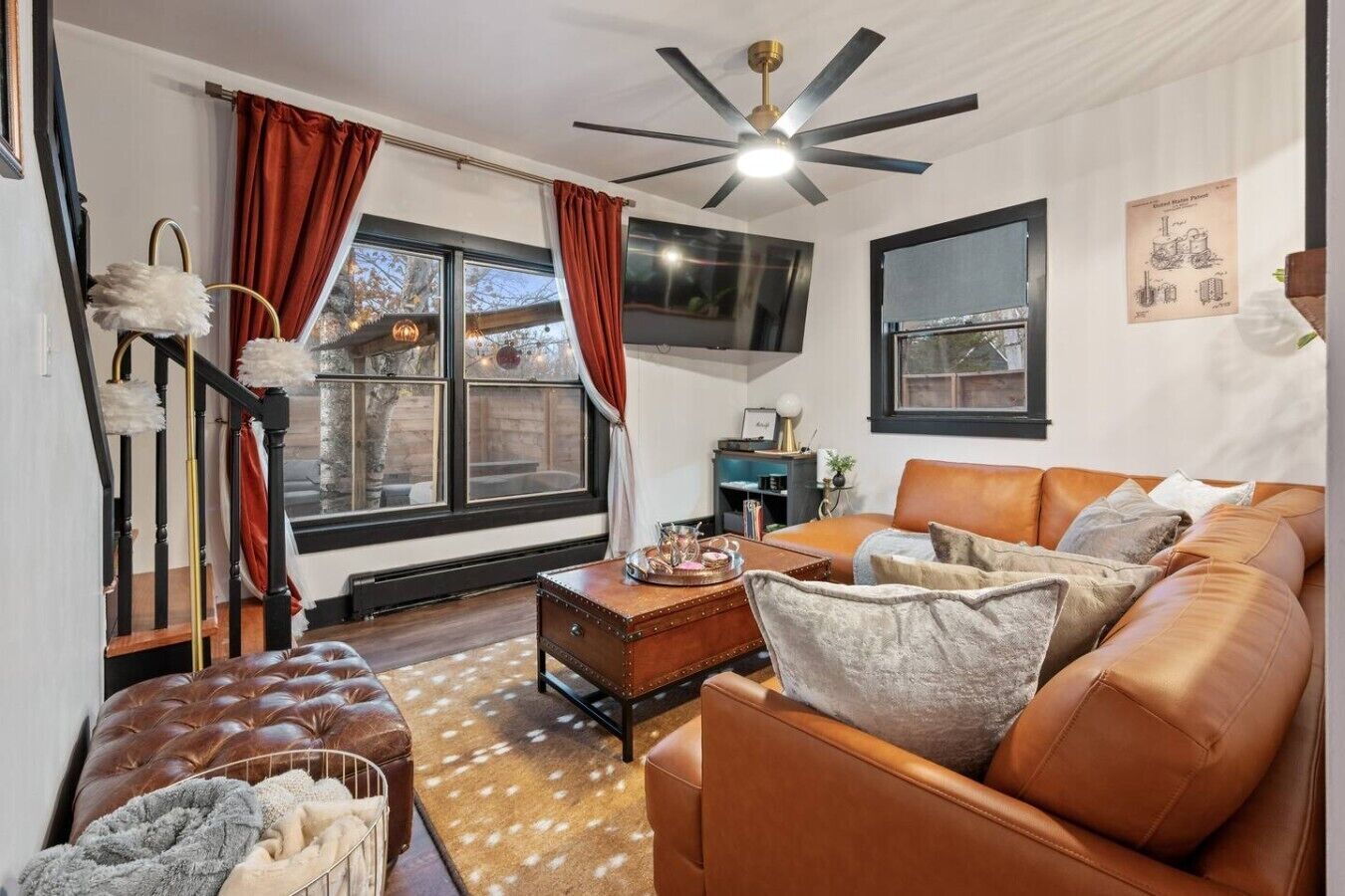 TV, fireplace, books, music library