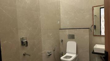 Shower, towels, soap, shampoo