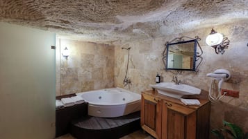 Hidden Library Magara Suite | Bathroom | Shower, designer toiletries, hair dryer, towels