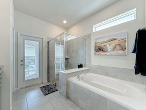 Shower, hair dryer, towels, toilet paper