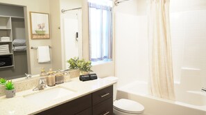 Hair dryer, towels, soap, shampoo