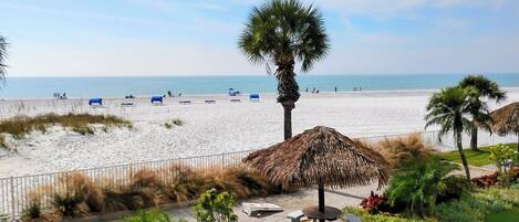 On the beach, sun loungers, beach towels