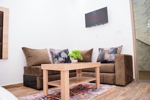 Chambre Double Luxe | Coin séjour
