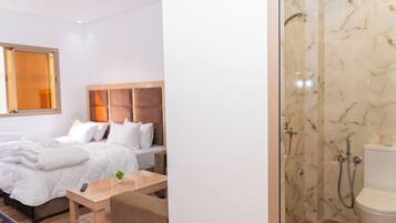 Chambre Confort Double ou avec lits jumeaux | Coin séjour