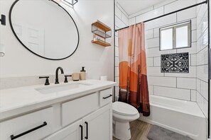Hair dryer, towels, soap, toilet paper