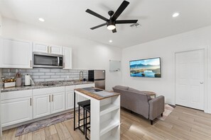 Fridge, microwave, coffee/tea maker, toaster