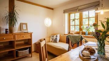 Comfort Apartment, Garden View | Living area