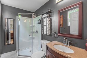 Shower, hair dryer, towels, soap