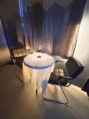 Suite estudio superior | Área de sala de estar