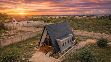 Cabana, vista para o jardim | Fachada