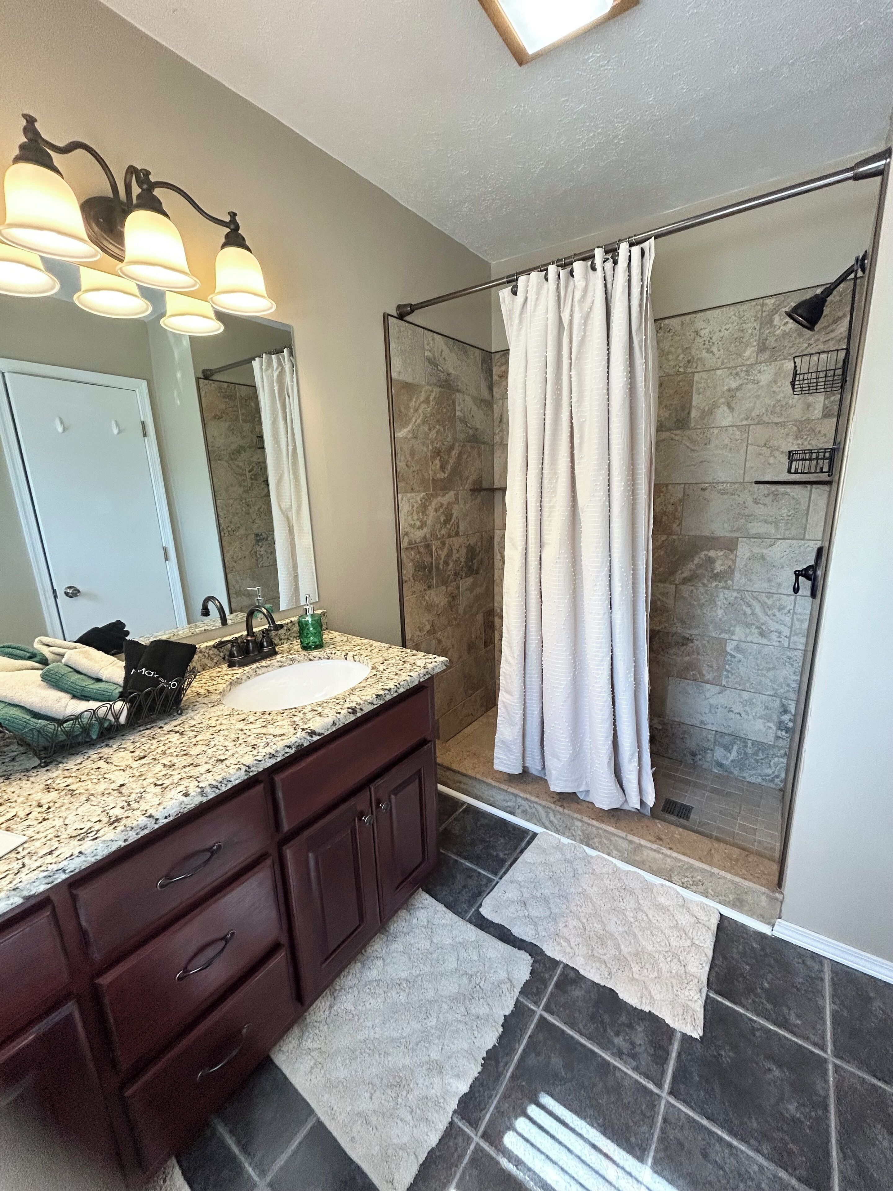 Hair dryer, towels, soap, shampoo