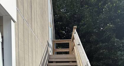 Cozy studio in enjoyable Lake Ronkonkoma area with AC and parking provided.