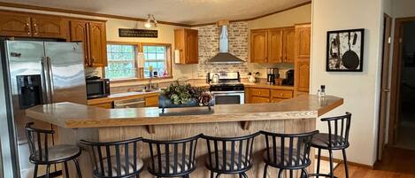 Refrigerador, microondas, horno y parrilla de estufa