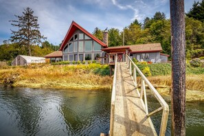 Exterior - Riverfront 3BR w/ Dock—Siletz Sanctuary II • 30+ Nights Lincoln City & Depoe Bay (Lincoln City)