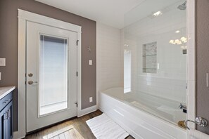 Shower, jetted tub, hair dryer, towels