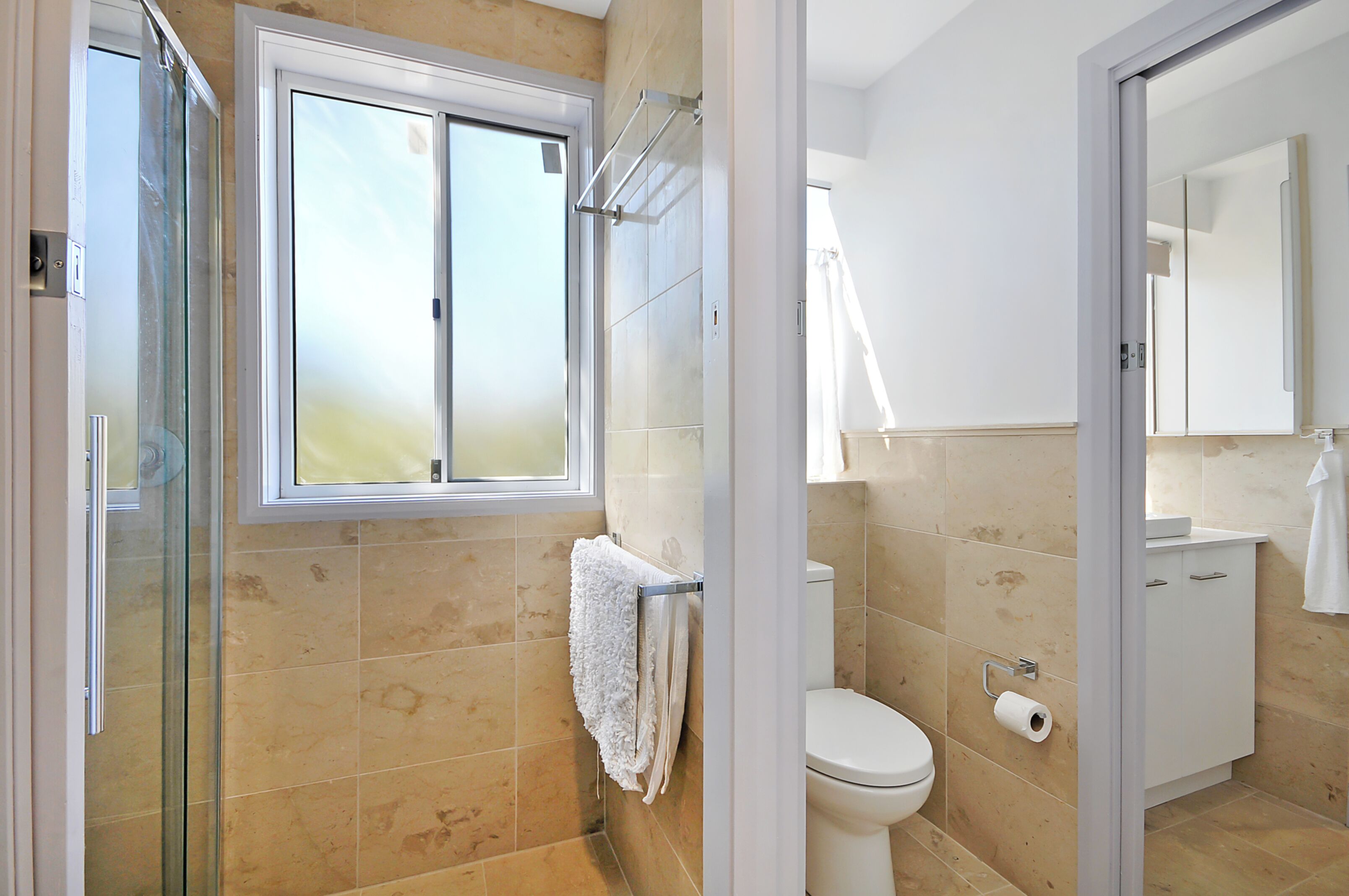 Shower, hair dryer, towels, soap