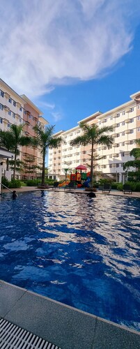 Enjoyable condo with AC in Trece Martires City