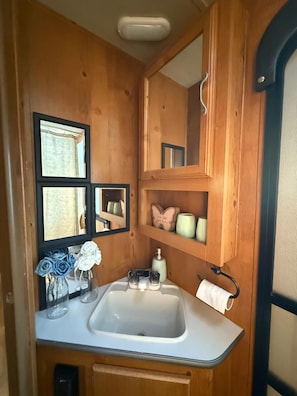 Hair dryer, towels, soap, toilet paper