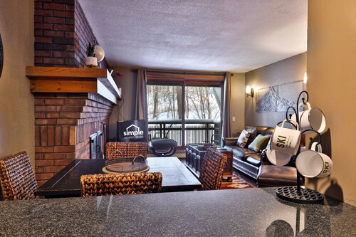 Ski-In/Ski-Out Sunrise Village Condo | 2BR, Fireplace, Pool