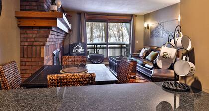 Ski-In/Ski-Out Sunrise Village Condo | 2BR, Fireplace, Pool