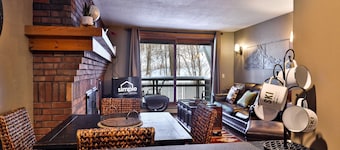 Ski-In/Ski-Out Sunrise Village Condo | 2BR, Fireplace, Pool
