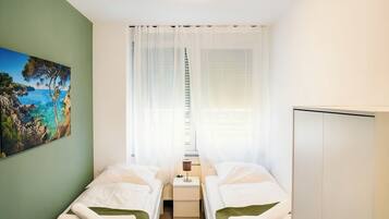 1 habitación, tabla de planchar con plancha, wifi y ropa de cama