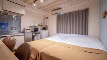 Rideaux occultants, fer et planche à repasser, Wi-Fi gratuit