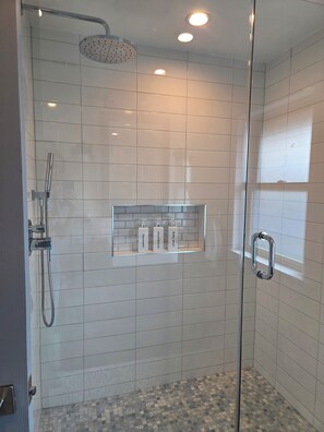 Shower, hair dryer, towels, soap