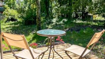 Standaard huisje, uitzicht op tuin | Terras