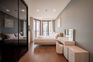 Economy Suite, City View | In-room safe, desk, laptop workspace, blackout drapes