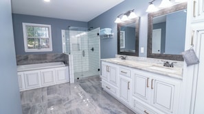 Jetted tub, hair dryer, towels, soap