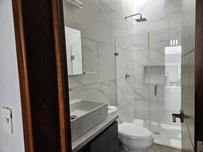 Shower, towels, soap, shampoo