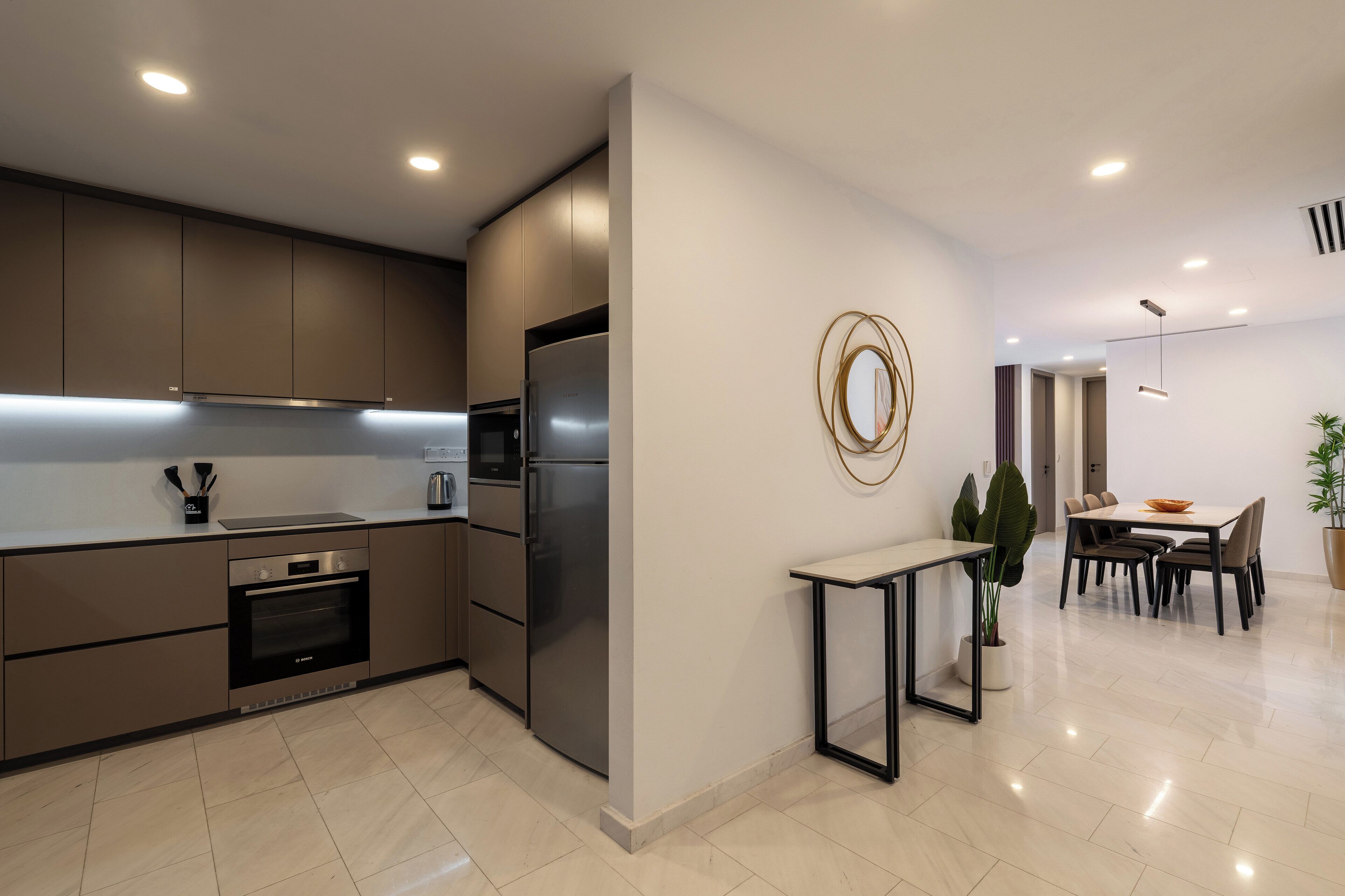 Fridge, microwave, cookware/dishes/utensils, dining tables